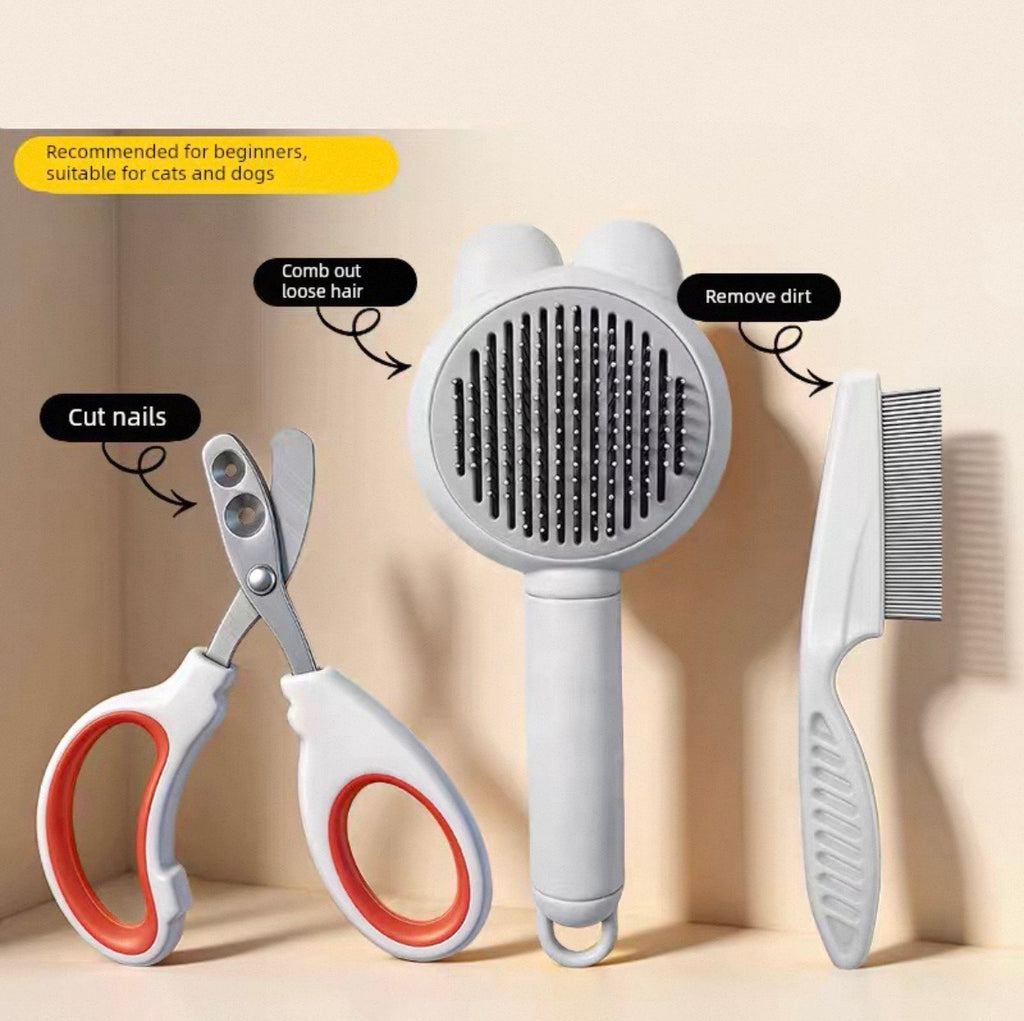 Pet grooming tools including scissors, a brush, and a deshedding tool on a beige background.